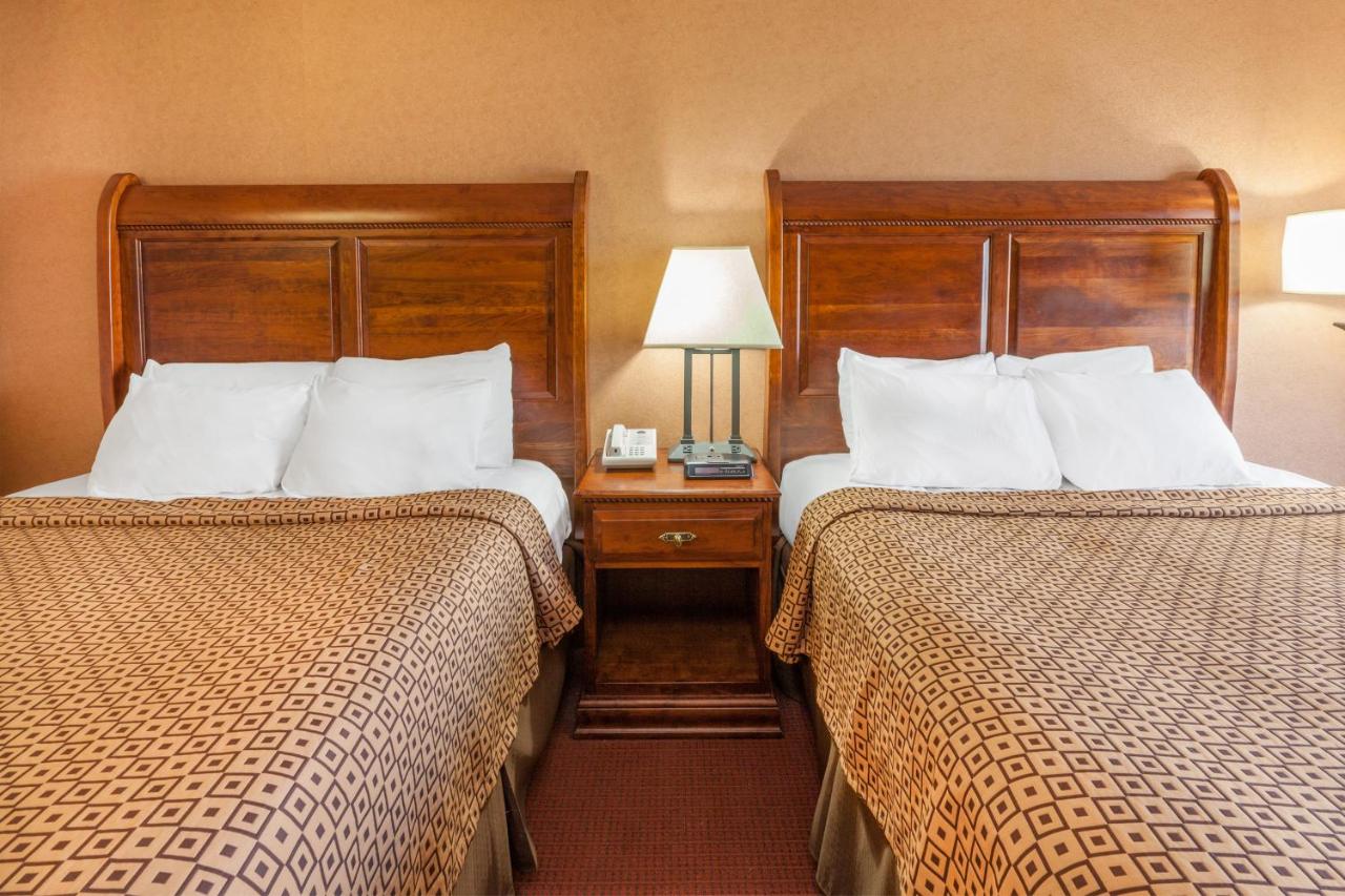 Deluxe Queen Room with Two Queen Beds - Disability Access - Non-Smoking at Ramada by Wyndham Mackinaw City Waterfront