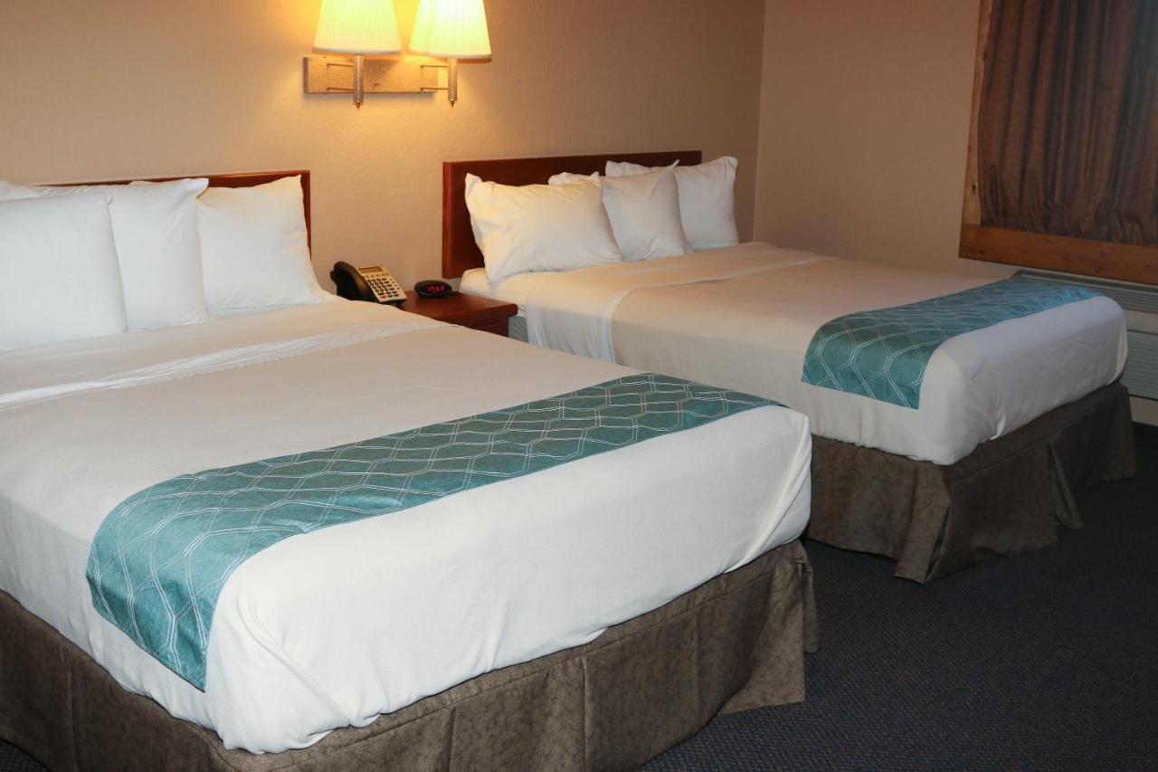 Queen Room with Two Queen Beds - Non-Smoking at Travelodge by Wyndham Gillette