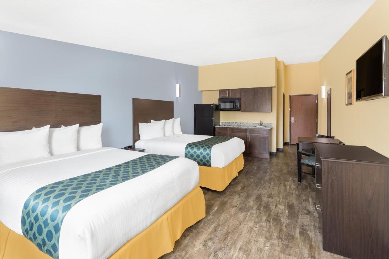 Queen Room with Two Queen Beds and Kitchenette - Non-Smoking at Days Inn by Wyndham New Orleans Pontchartrain
