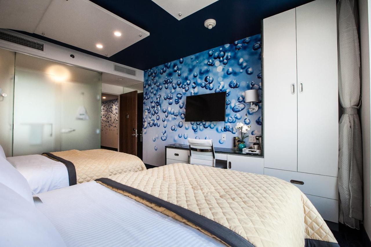 Deluxe Quadruple Room at Wyndham Garden Brooklyn Sunset Park