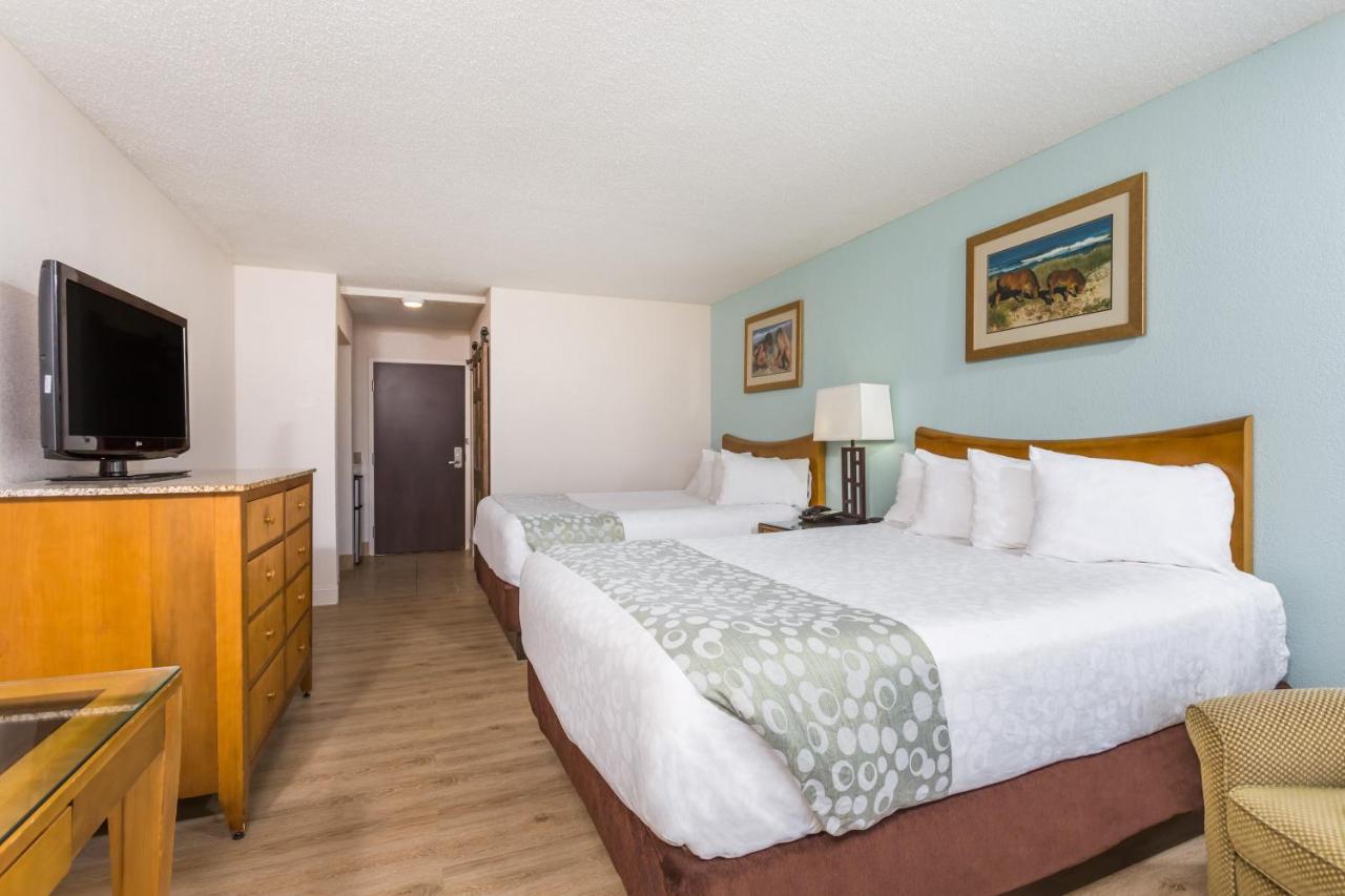 Queen Room with Two Queen Beds and Ocean View - Mobility Access/Non-Smoking at Ramada Plaza by Wyndham Nags Head Oceanfront