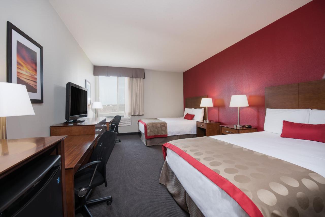 Queen Room with Two Queen Beds - Disability Access - Non-Smoking at Bakken Airport XWA Hotel & Studios