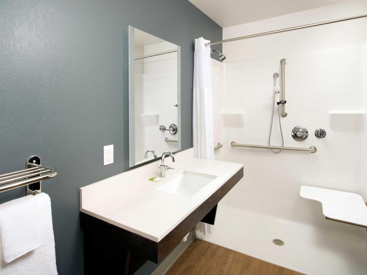 Queen Room with Roll-In Shower - Disability Access/Non-Smoking at WoodSpring Suites Daytona Beach Int'l Speedway
