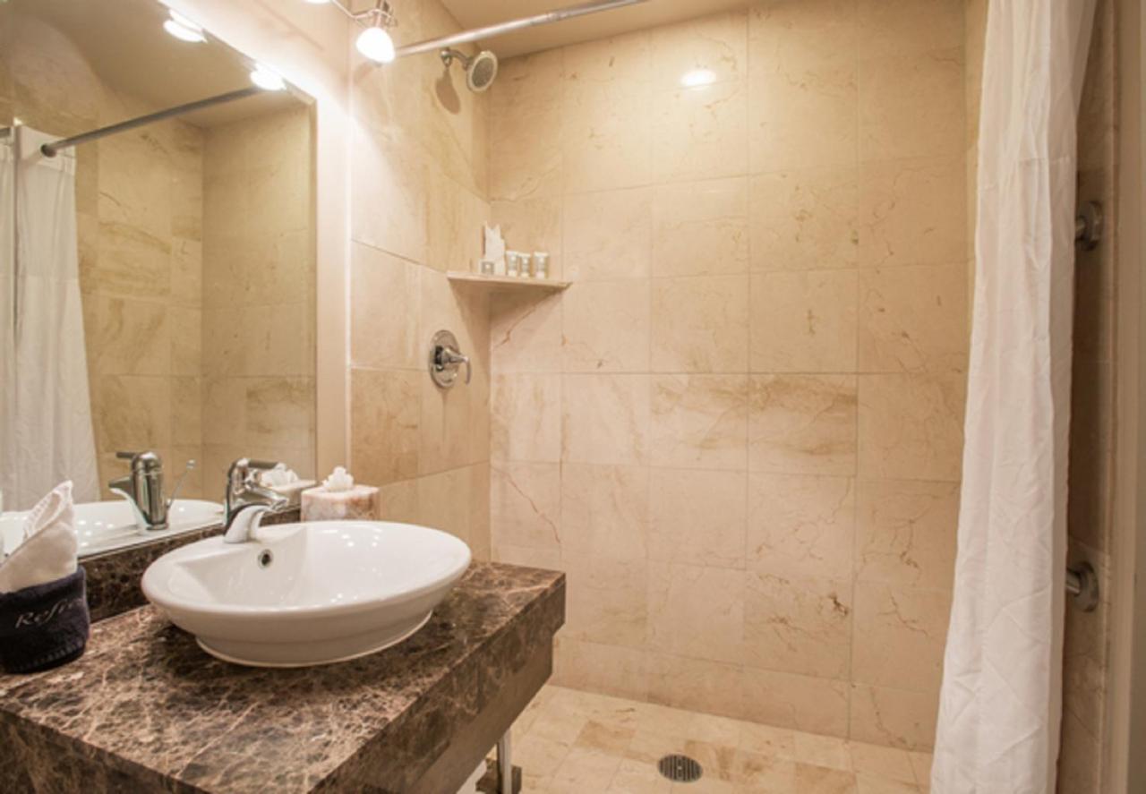 Accessible Queen Room with Roll In Shower at Magnolia Omaha Downtown Old - Market