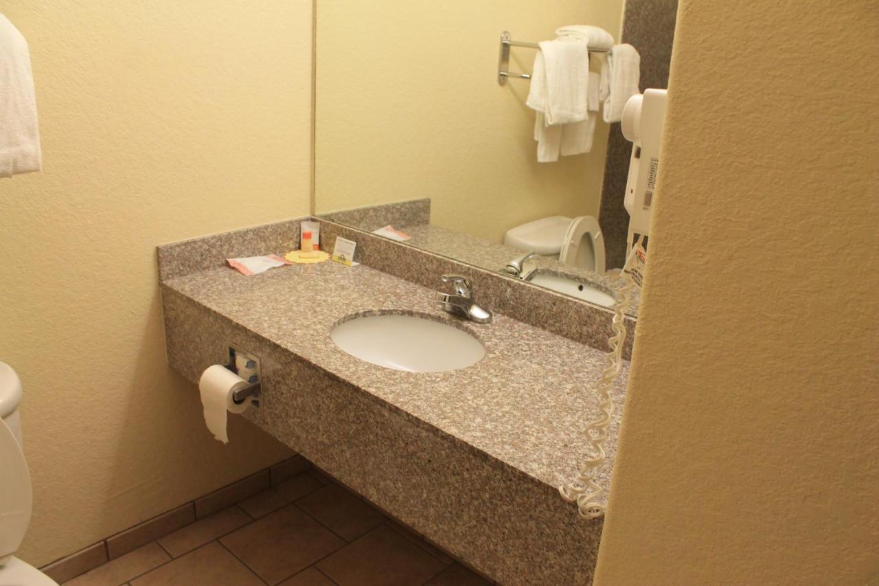 Queen Room with Two Queen Beds - Non-Smoking at Days Inn by Wyndham San Antonio at Palo Alto