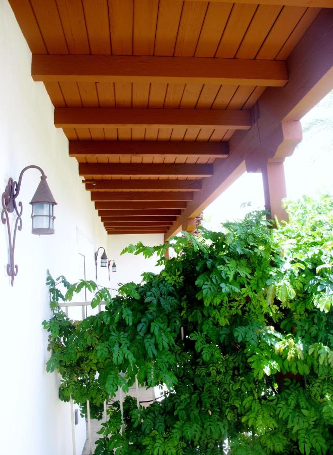 Deluxe King Room with Patio and Fireplace at Alcazar Palm Springs