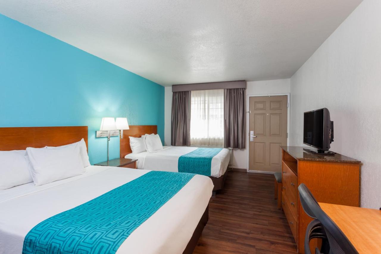Queen Room with Two Queen Beds - Non-Smoking at Howard Johnson by Wyndham National City/San Diego South