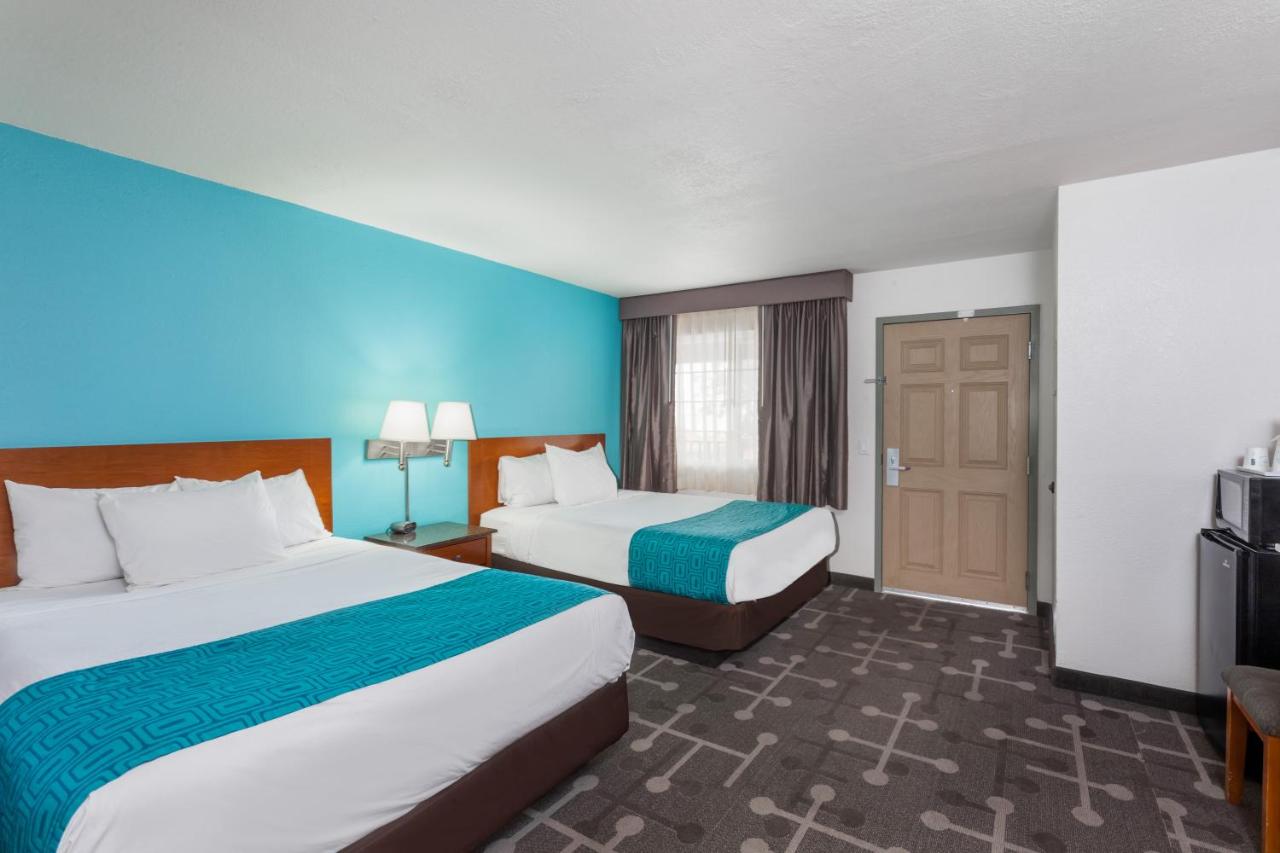 Queen Room with Two Queen Beds - Non-Smoking at Howard Johnson by Wyndham National City/San Diego South