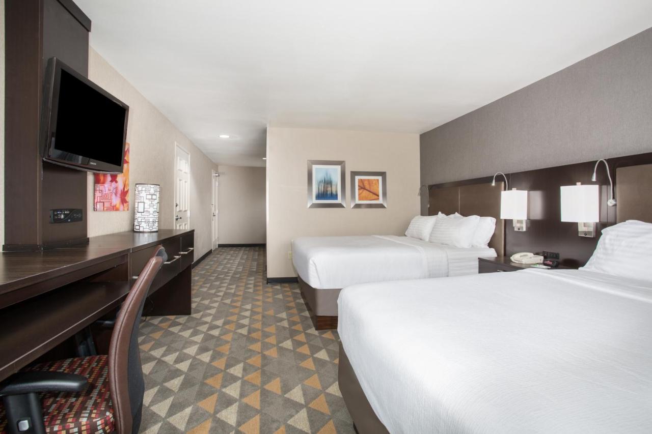 Queen Room with Two Queen Beds at Holiday Inn Colorado Springs Airport, an IHG Hotel