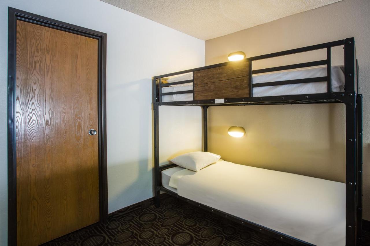 Studio Suite with Two Queen Beds and Bunk Bed - Non-Smoking at Super 8 by Wyndham Flagstaff