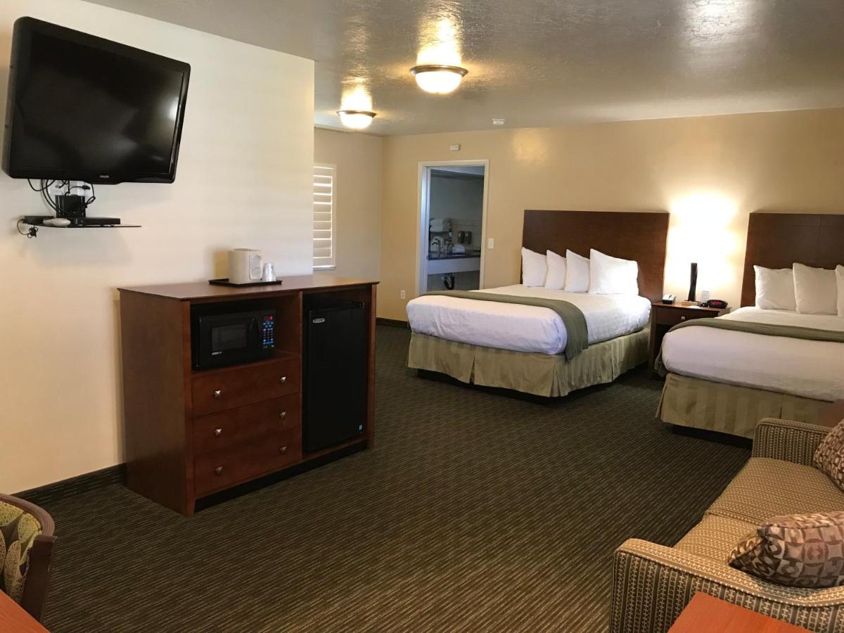 Two Queen Suite with Roll-In Shower - Non-Smoking/Disability Access at Dinosaur Inn & Suites