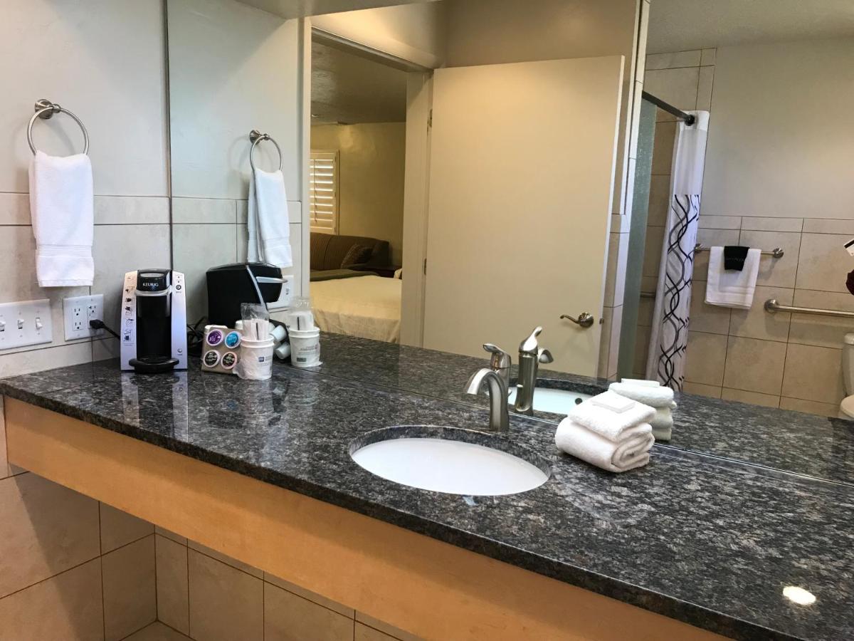 Two Queen Suite with Roll-In Shower - Non-Smoking/Disability Access at Dinosaur Inn & Suites