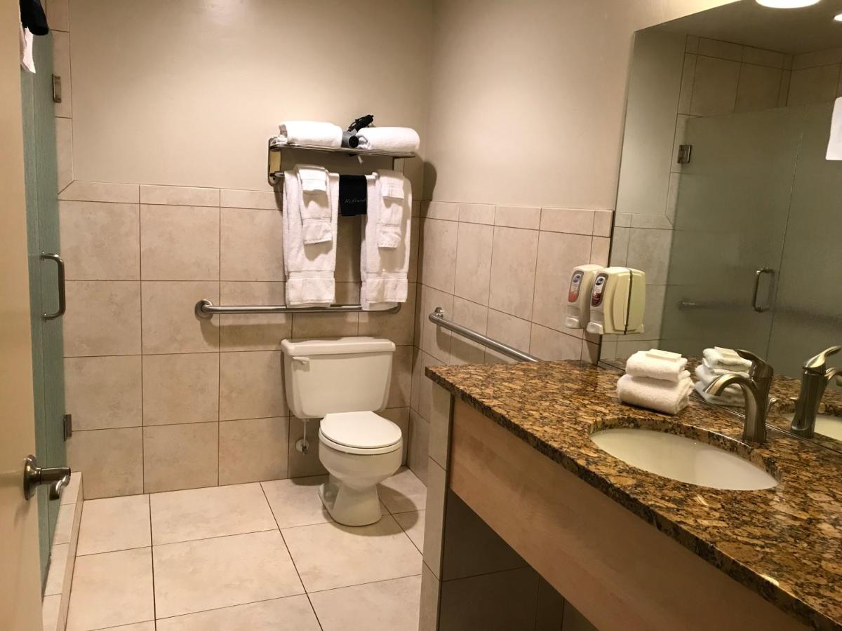 Queen Room with Two Queen Beds and Walk-in Shower - Disability Access at Dinosaur Inn & Suites