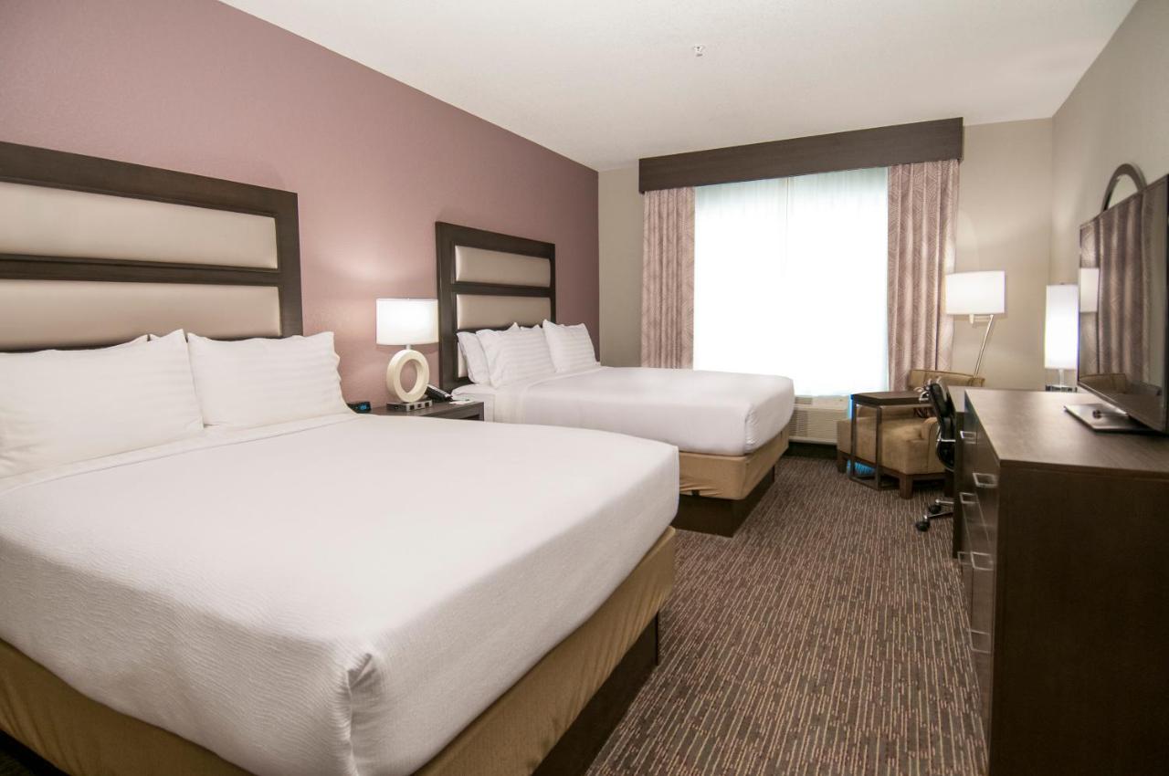 Queen Room with Two Queen Beds - Hearing Accessible/Non-Smoking at Holiday Inn New Orleans Airport North by IHG