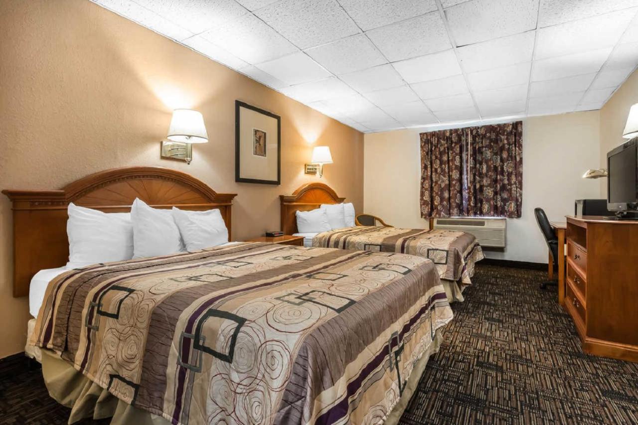 Queen Room with Two Queen Beds and Sofa Bed - Non-Smoking at Quality Inn & Suites Binghamton Vestal