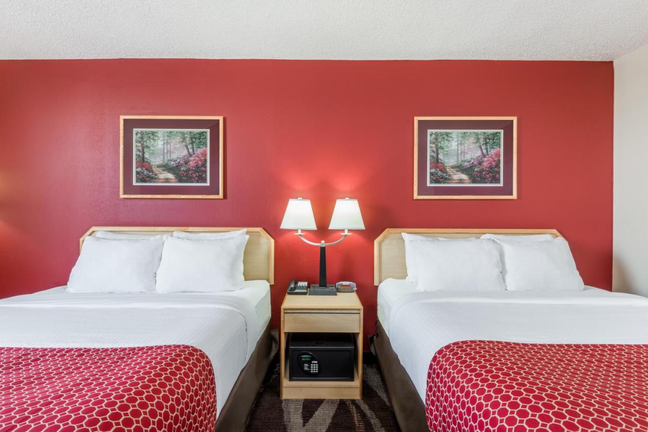 Deluxe Queen Room with Two Queen Beds - Non-Smoking at Days Inn by Wyndham Gillette