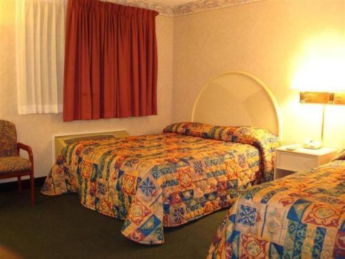Queen Room with Two Queen Beds at O'Hare Inn & Suites