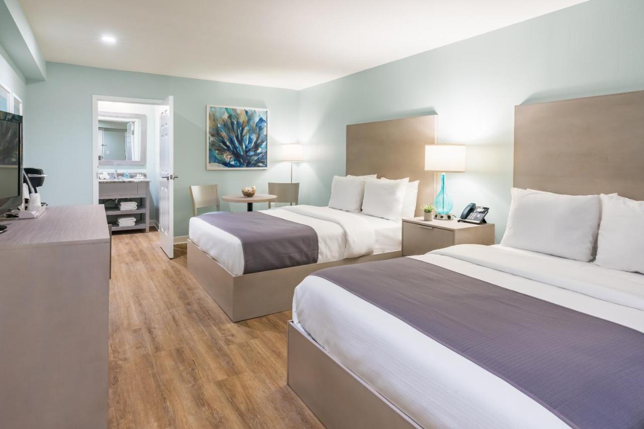 Interior Queen Room with Two Queen Beds at The Palms Oceanfront Hotel