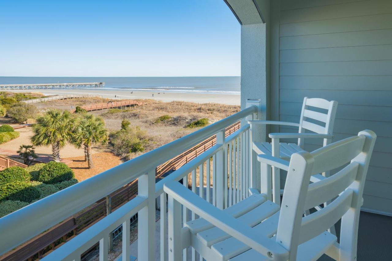 Queen Room with Balcony and Partial Ocean View at The Palms Oceanfront Hotel