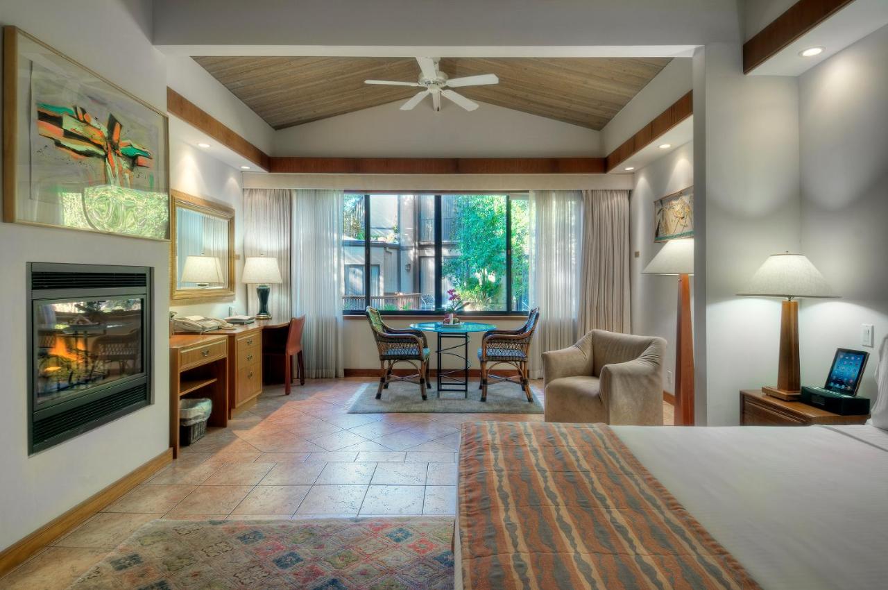King Suite with Fireplace at Dinah's Garden Hotel
