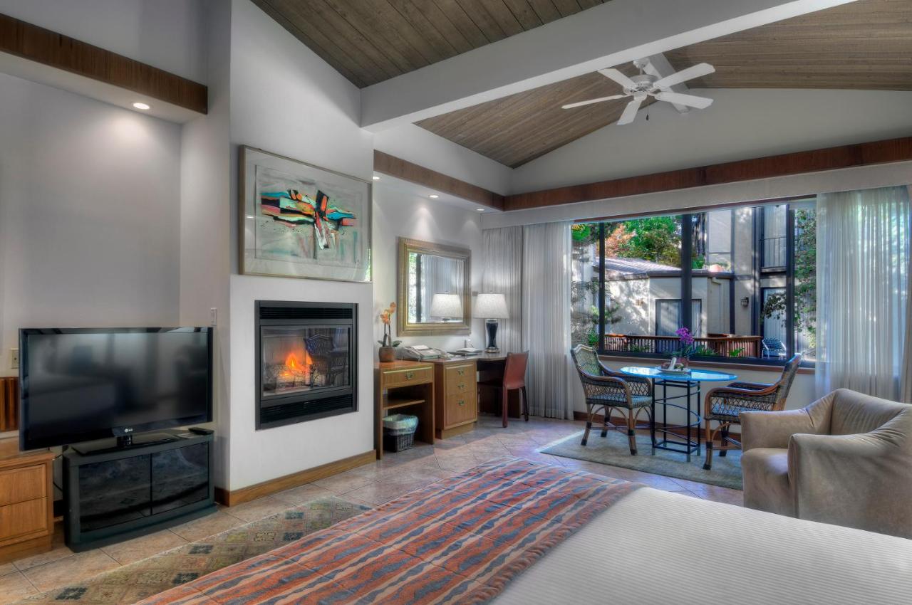 King Suite with Fireplace at Dinah's Garden Hotel