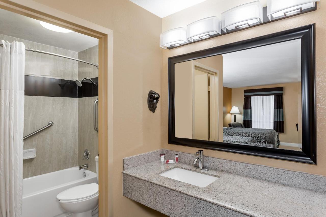 Queen Room with Two Queen Beds - Non-Smoking at Days Inn by Wyndham Sarasota Bay
