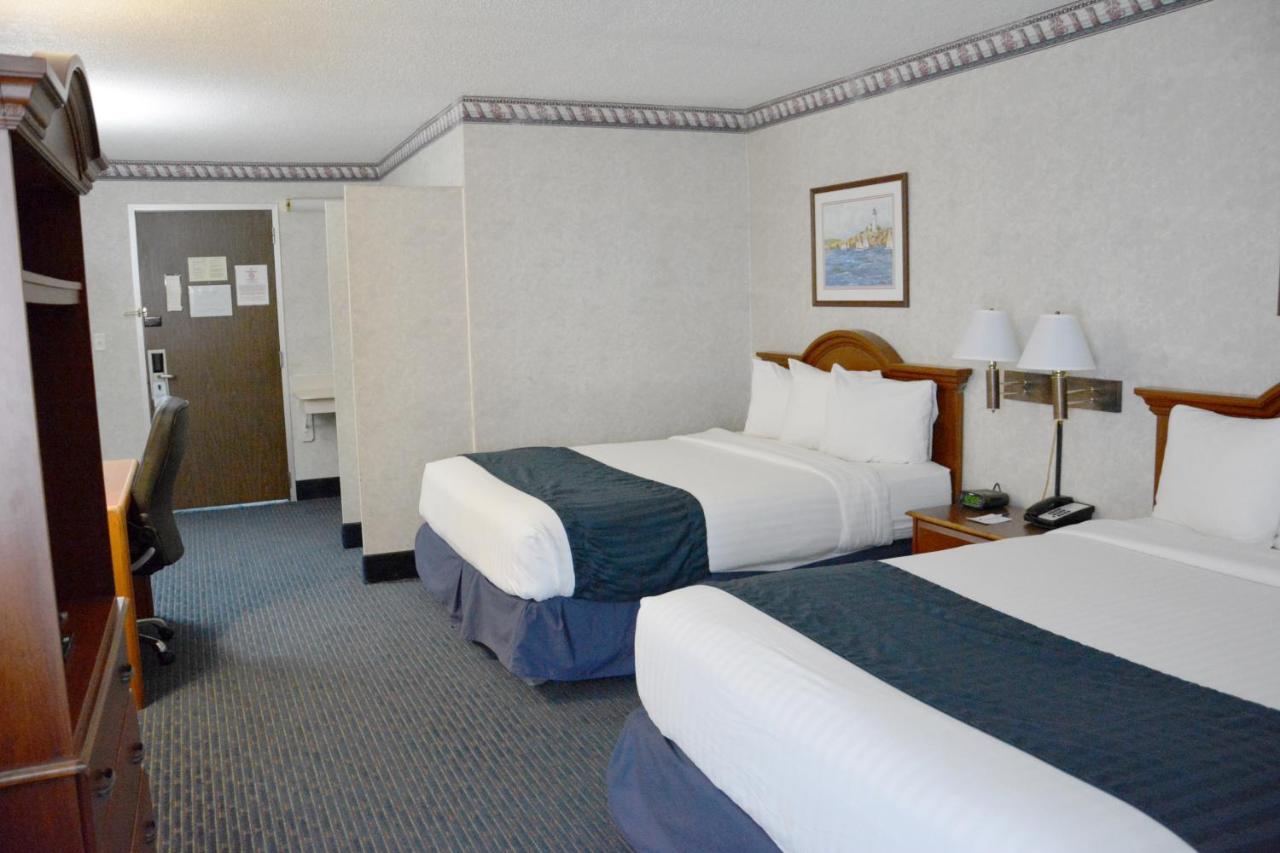 Queen Room with Two Queen Beds - Non-Smoking at Travelodge by Wyndham Milwaukee