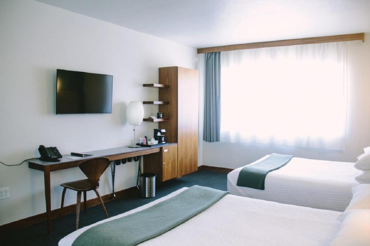 Queen Room with Two Queen Beds at Modern Hotel