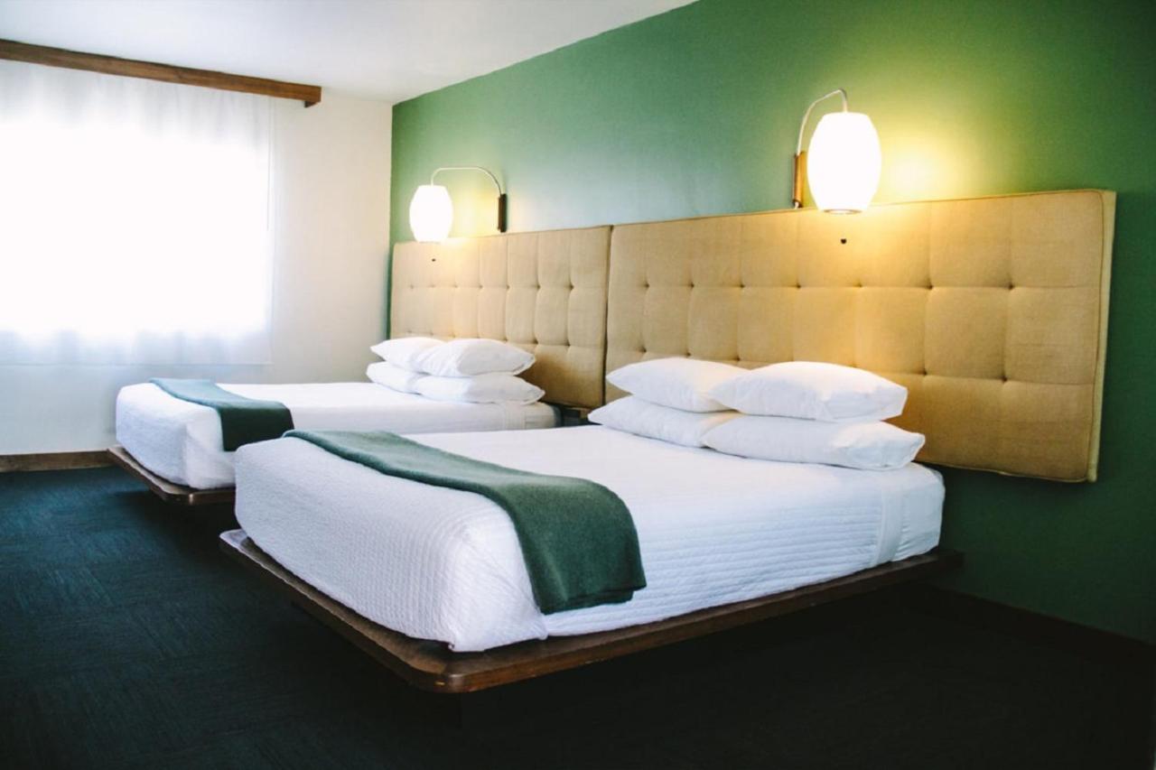 Queen Room with Two Queen Beds at Modern Hotel