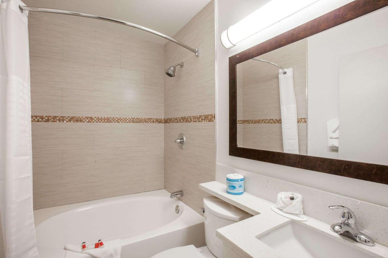 King Suite with One King Bed and One Queen Bed - Non-Smoking at Days Inn by Wyndham Orange Anaheim