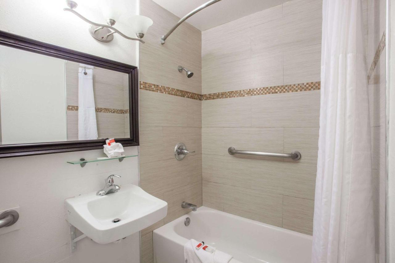 King Suite with One King Bed and One Queen Bed - Non-Smoking at Days Inn by Wyndham Orange Anaheim