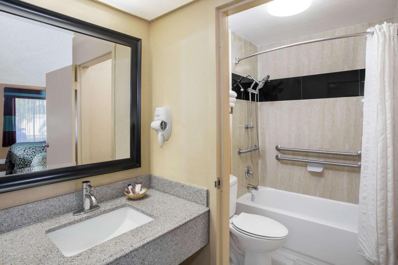 Deluxe Quadruple Room with Two Double Beds - Disability Access - Non-Smoking at Days Inn by Wyndham Sarasota Bay