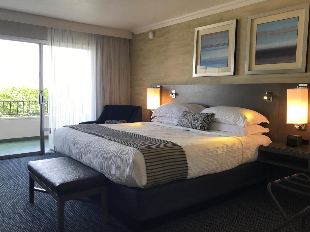King Room with Harbor View at West Beach Inn, a Coast Hotel