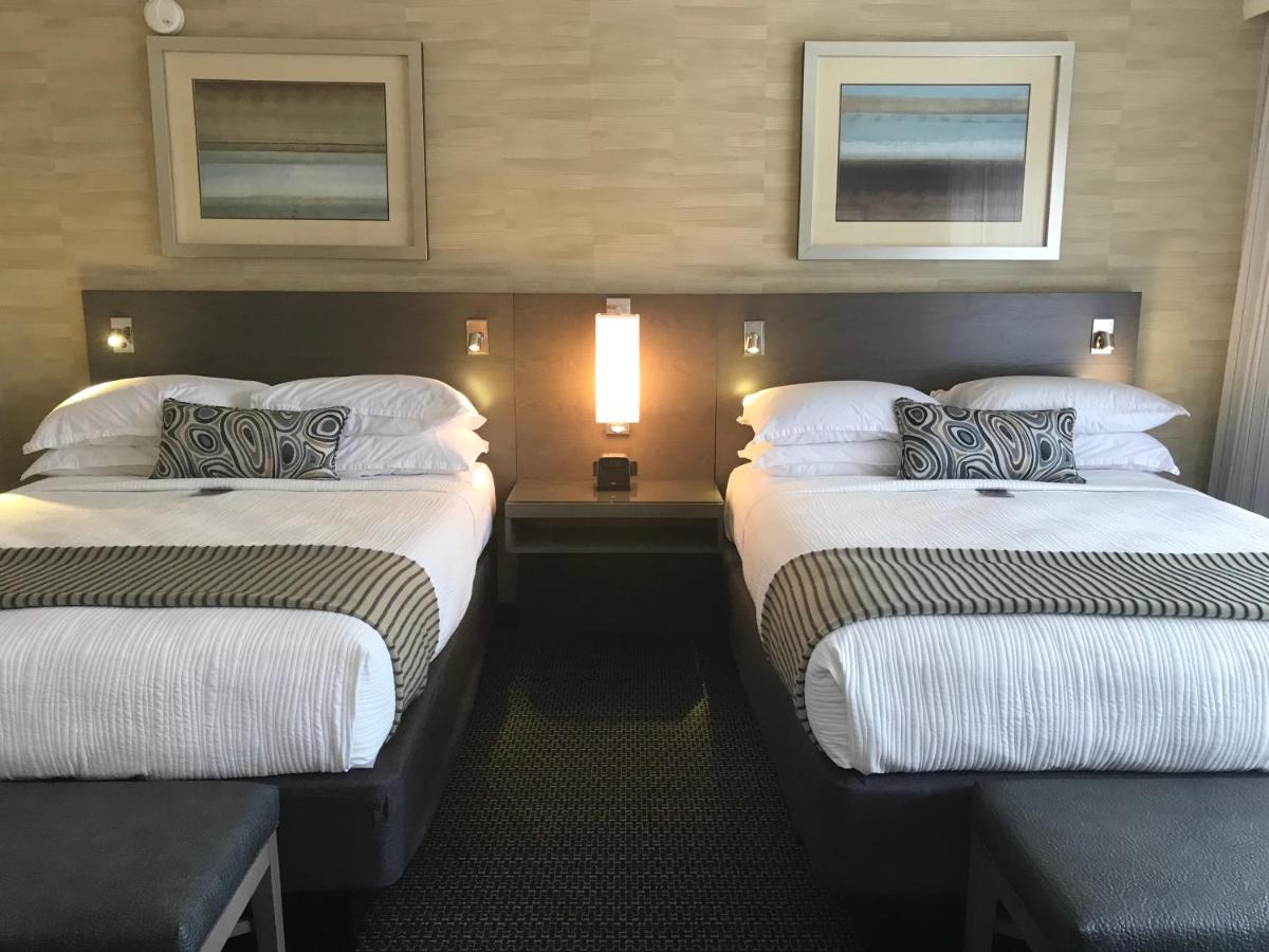 Queen Room with Two Queen Beds and Harbor View at West Beach Inn, a Coast Hotel