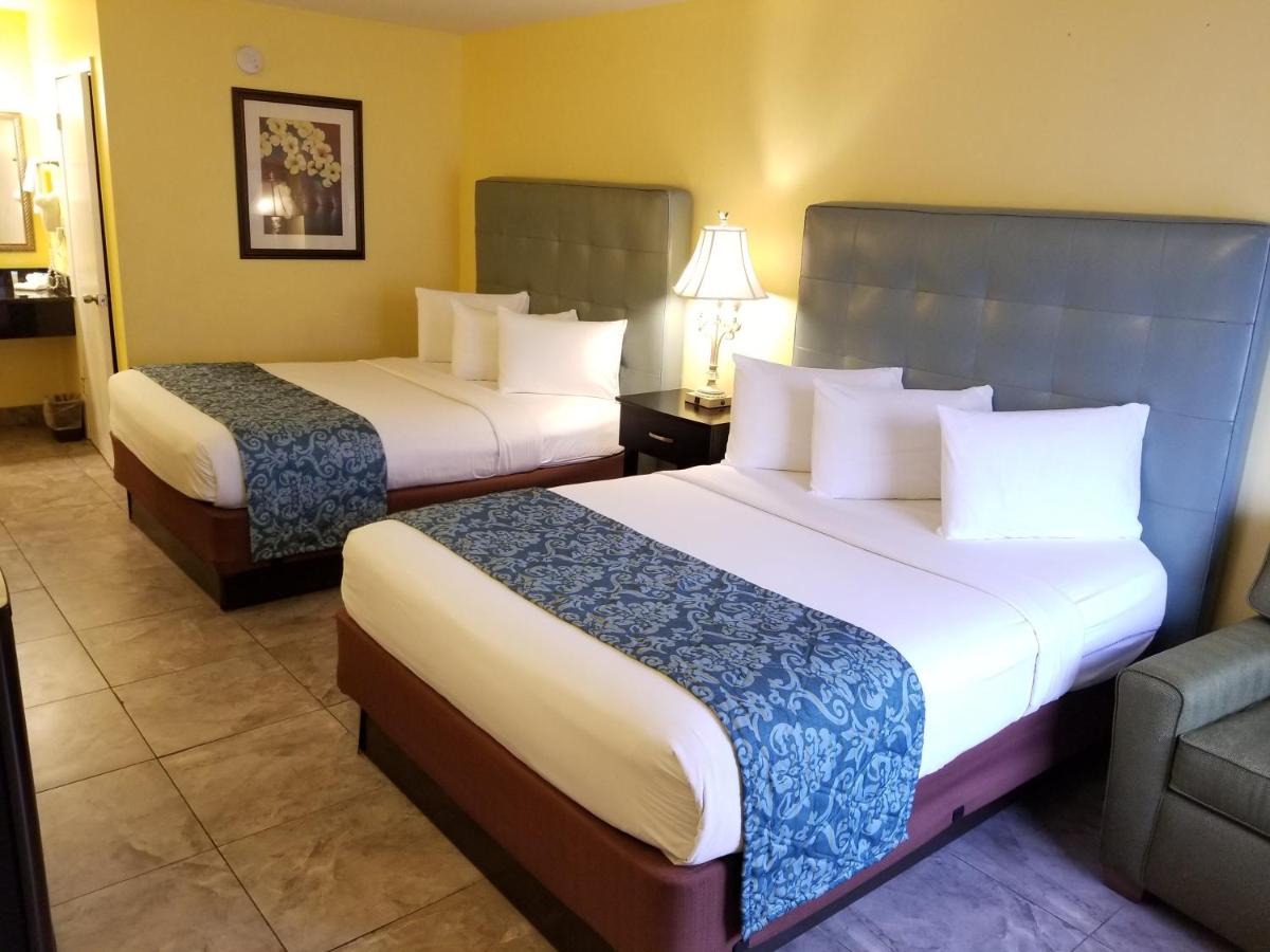 Queen Room with Two Queen Beds at Shining Light Inn & Suites