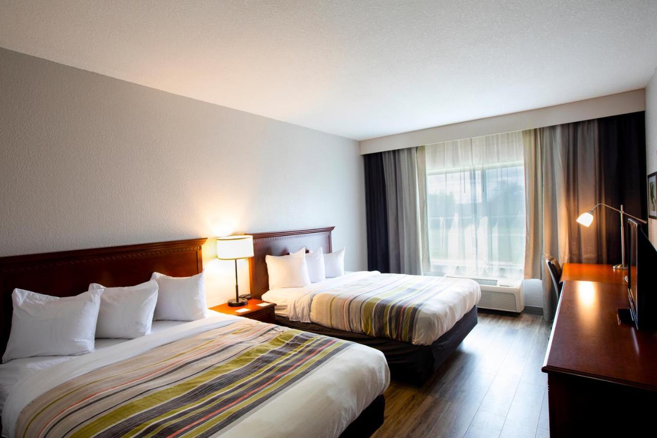 Queen Room with Two Queen Beds at Country Inn & Suites by Radisson, Wilson, NC