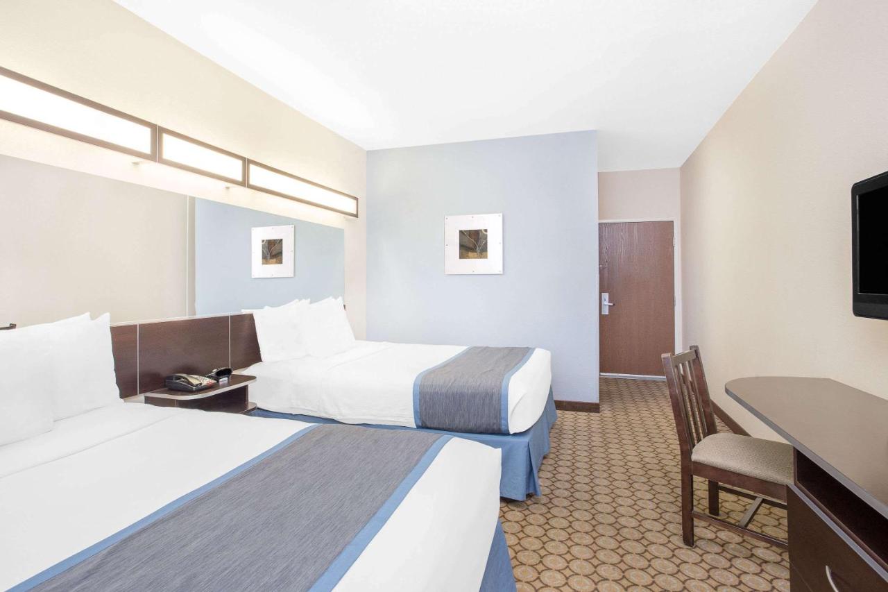 Queen Room with Two Queen Beds - Non-Smoking at Microtel Inn & Suites by Wyndham San Angelo