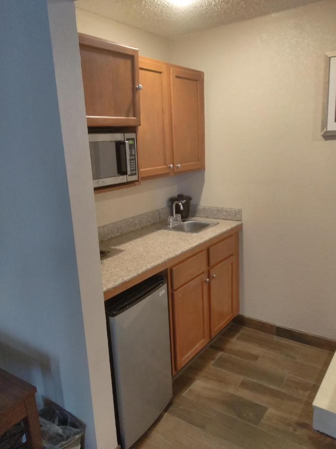 King Suite with Spa Bath and Sofa Bed at Baymont by Wyndham Madison Heights Detroit Area