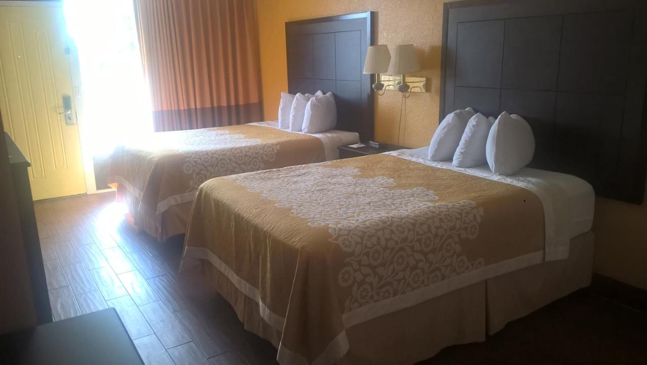 2 Queen Beds, Mobility Accessible Room, Pool Side, Non-Smoking at Days Inn & Suites by Wyndham Port Richey