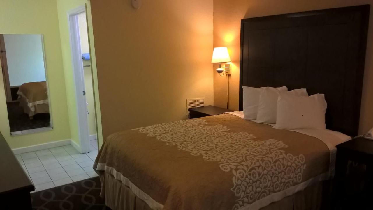 Queen Room - Non-Smoking at Days Inn & Suites by Wyndham Port Richey