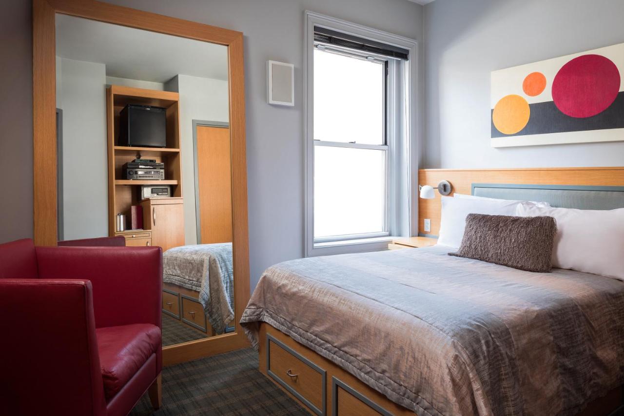Queen Room at Charlesmark Hotel