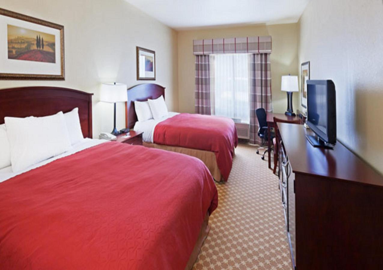 Queen Room with Two Queen Beds at Country Inn & Suites by Radisson, Tulsa, OK