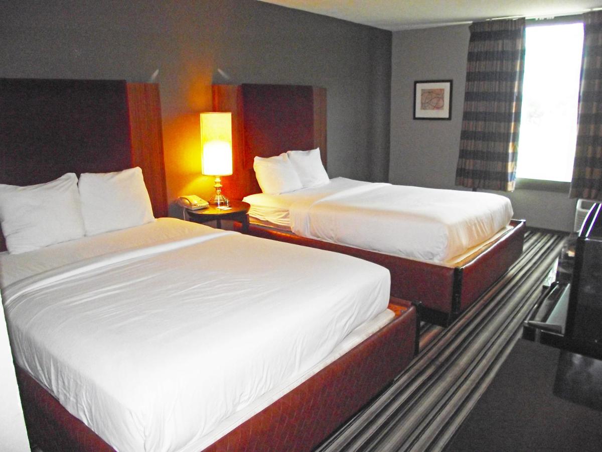 Queen Room with Two Queen Beds - Non-Smoking at Travelodge by Wyndham Memphis Airport/Graceland