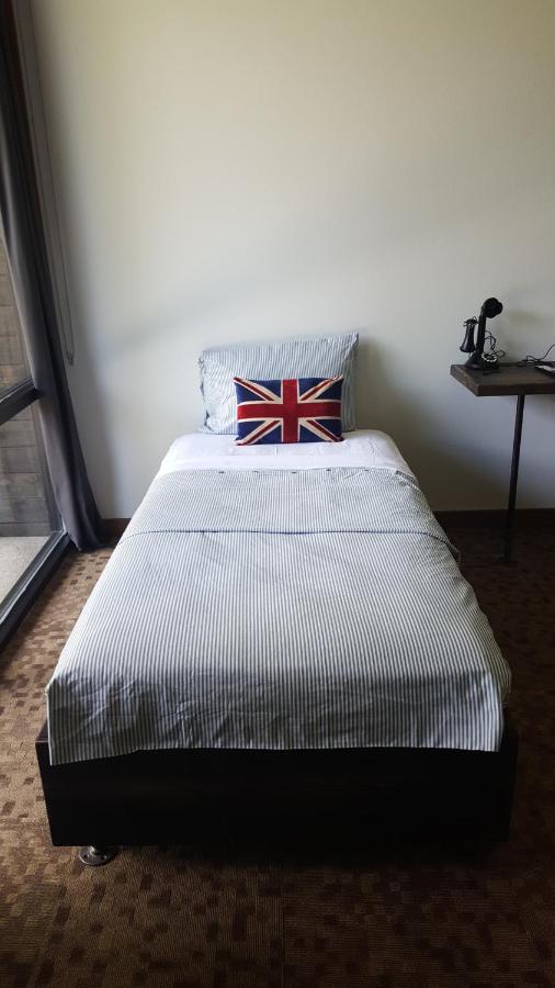 King Room with One King and One Twin Bed at Okoboji Commons Hotel