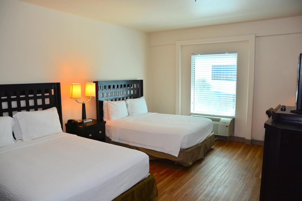 Deluxe Queen with Kitchenette and Sofa Bed at Sunchase Inn & Suites