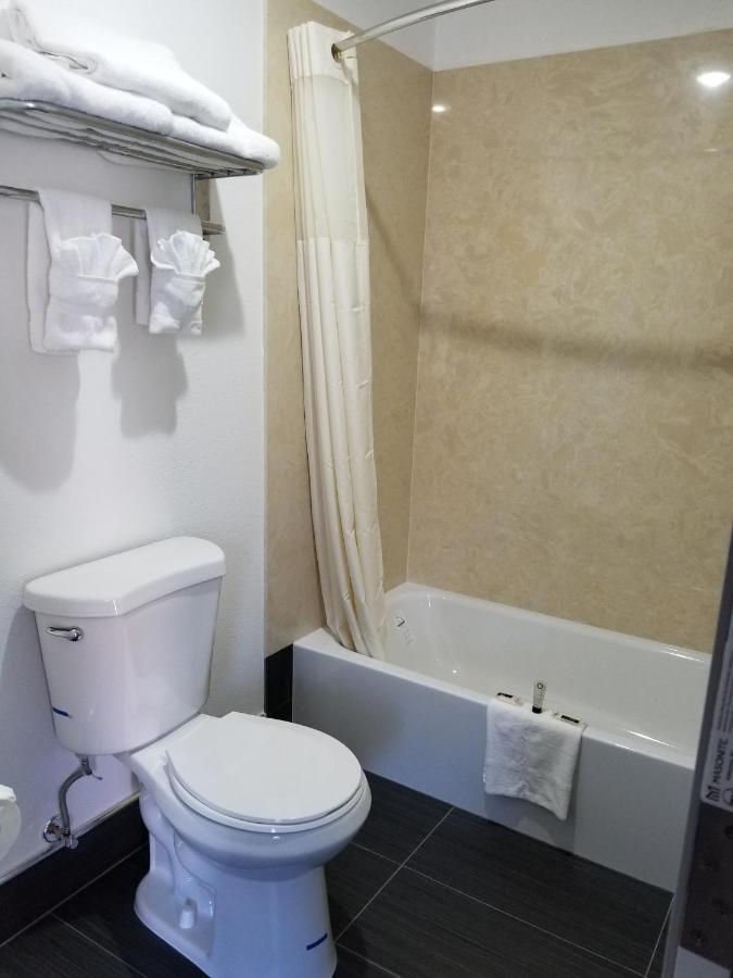 | TRAVIS LODGE MOTEL 16