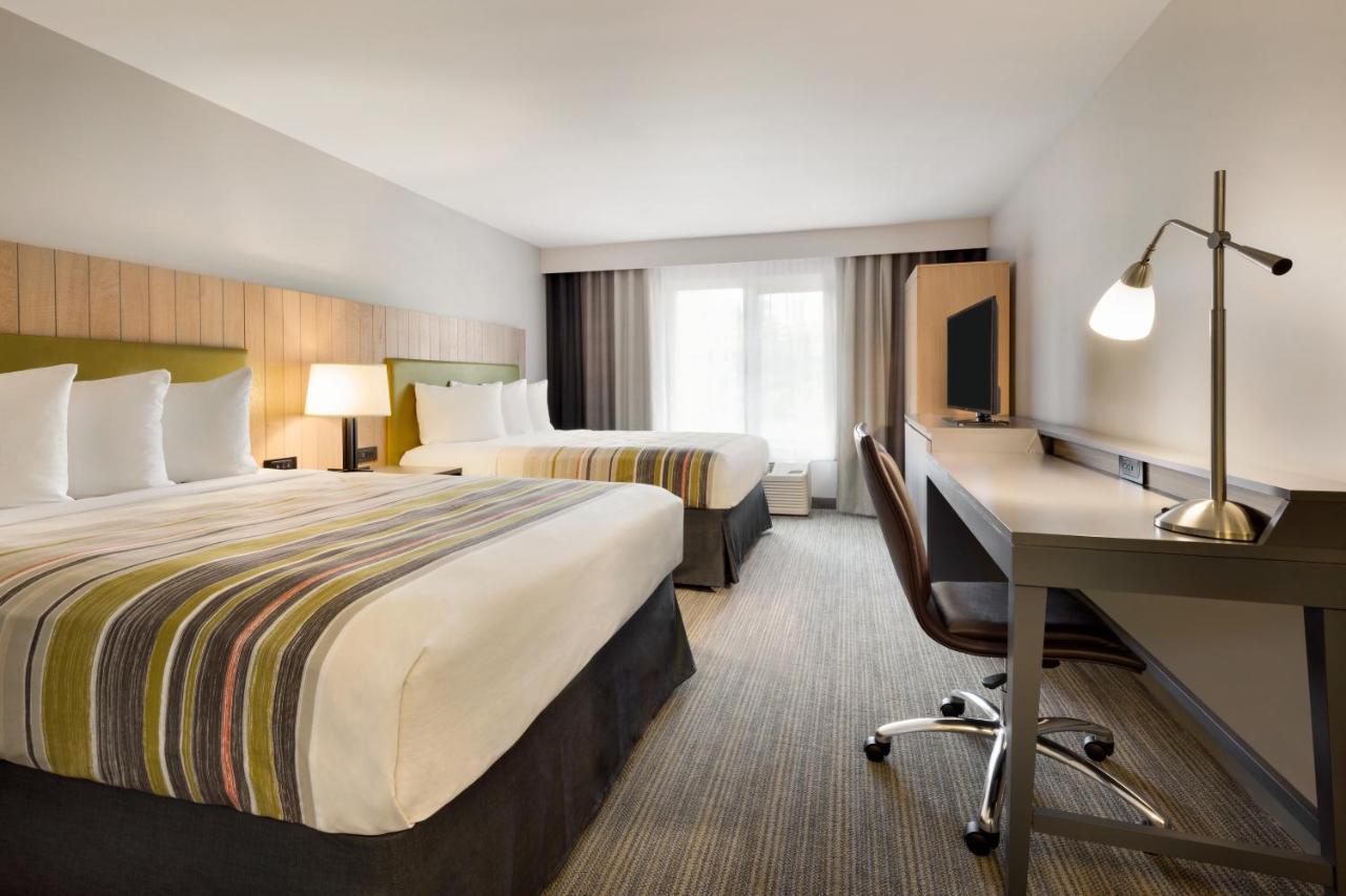 Queen Room with Two Queen Beds at Country Inn & Suites by Radisson, San Diego North, CA