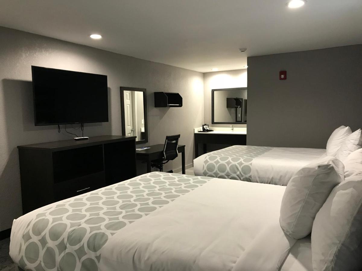 Standard Queen Room with Two Queen Beds - Non-Smoking at Rodeway Inn Calhoun South