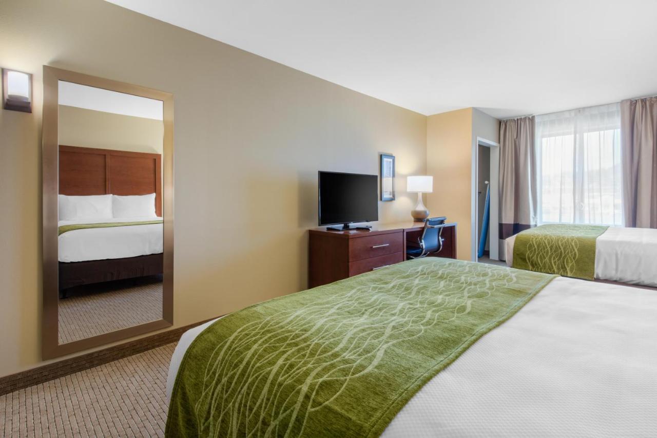 Queen Room with Two Queen Beds - Non-Smoking at Comfort Inn & Suites at CrossPlex Village