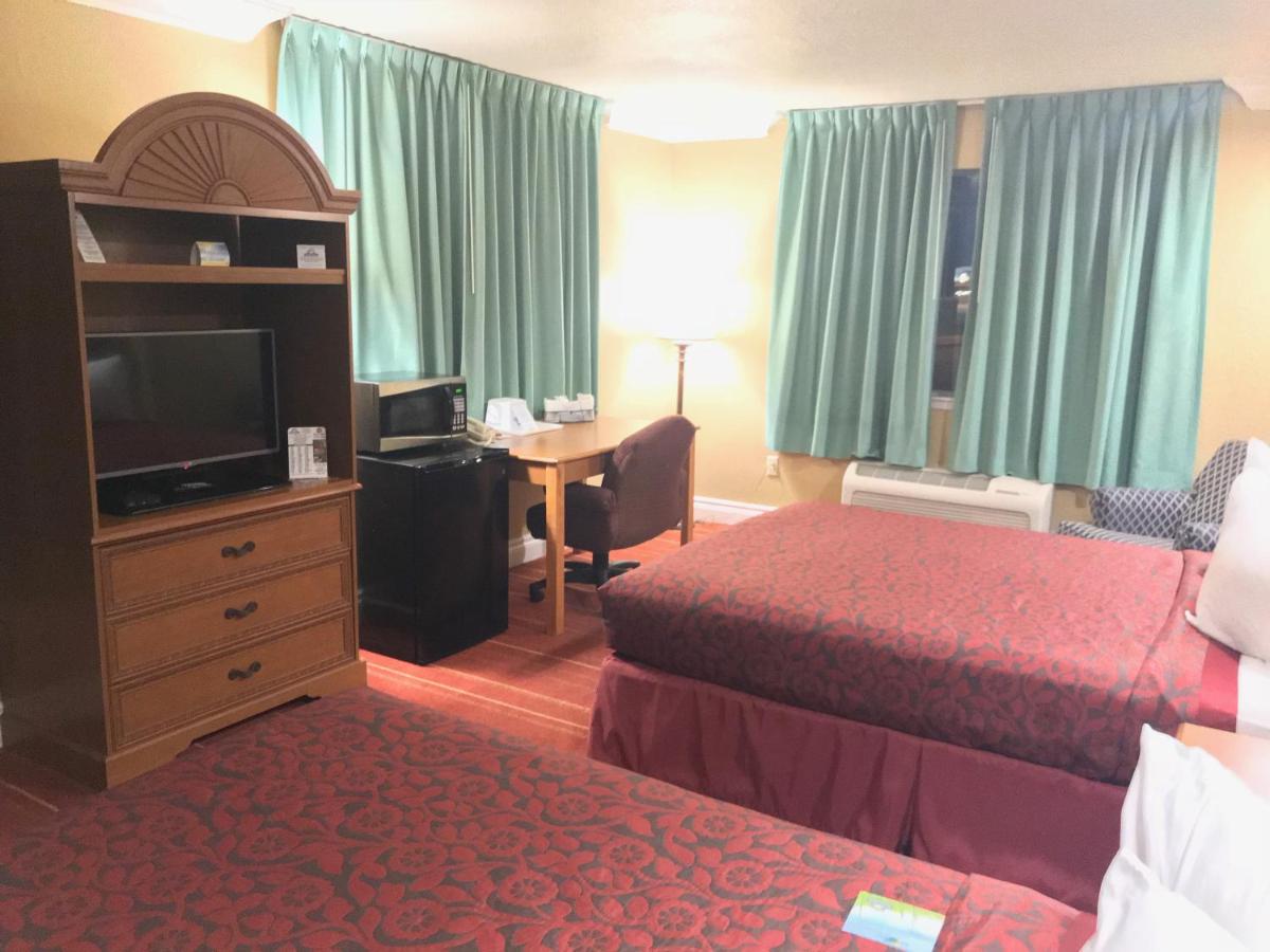 NQQ1 Queen Room with Two Queen Beds - Non-Smoking at Days Inn by Wyndham San Antonio Airport